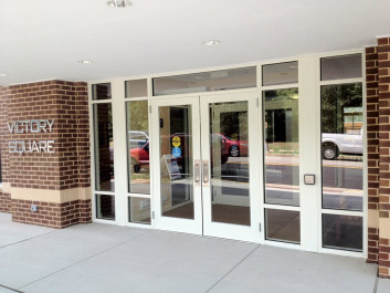 Victory Square entry way glass doors and windows