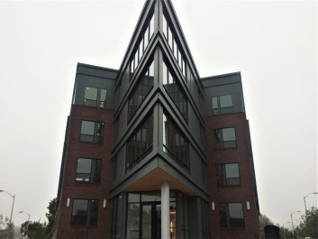 black commercial building with newly installed windows